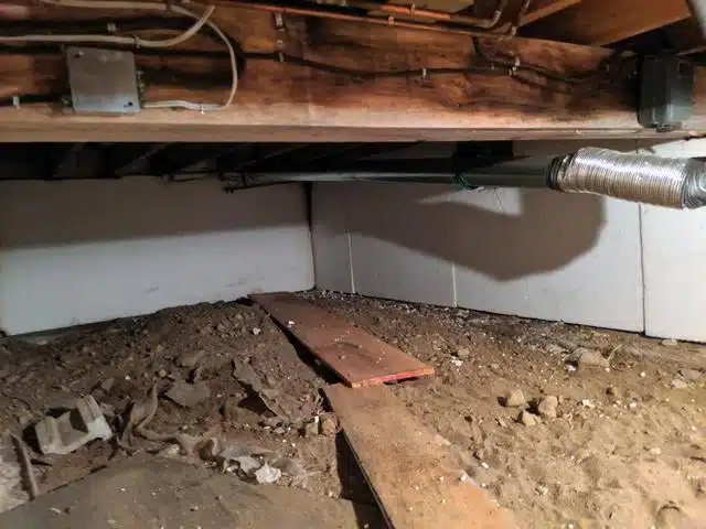 Crawl space before repair